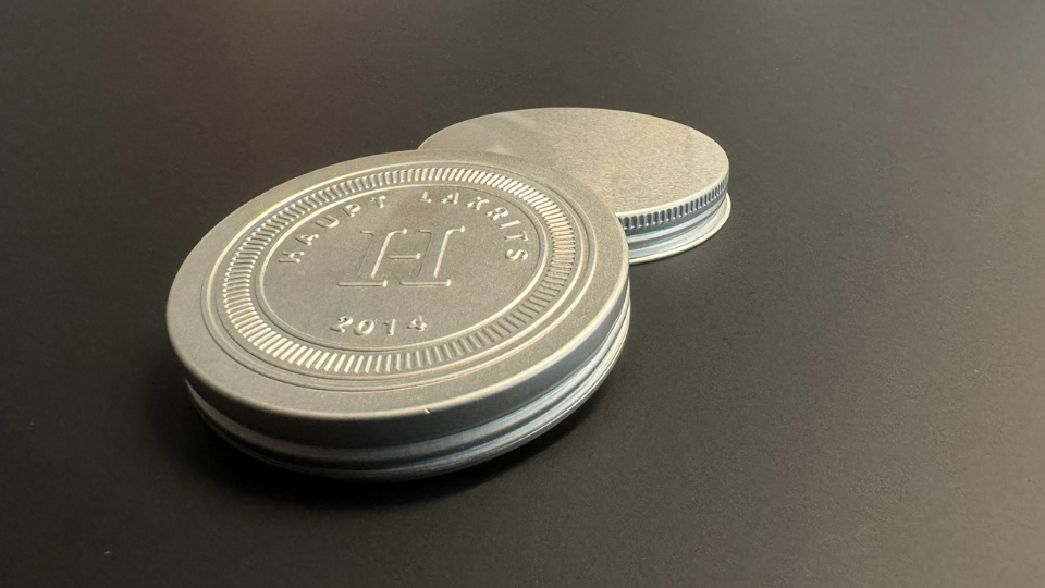 Prägung für Deckel